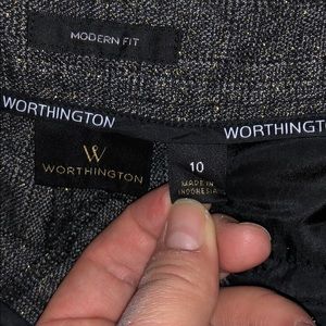 Black and gold tapered leg pants.